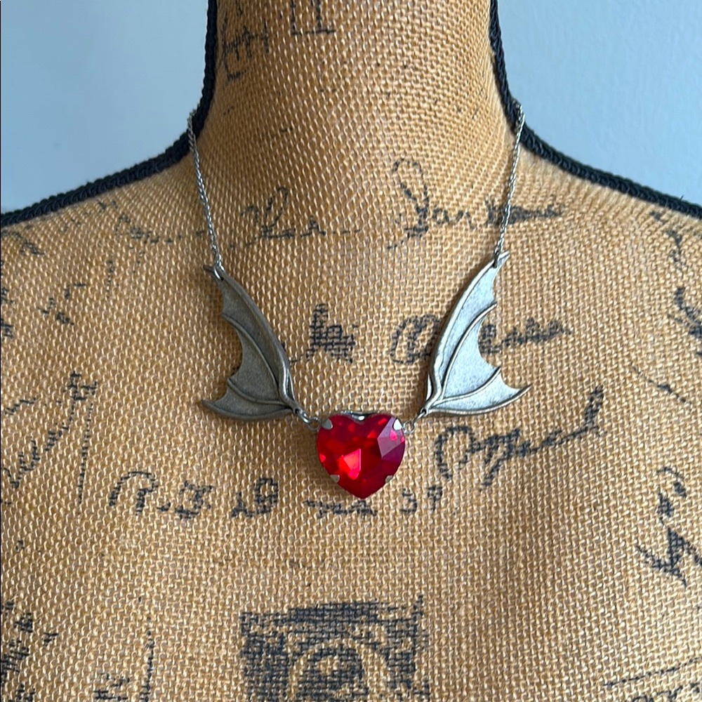 Bat wing heart necklace